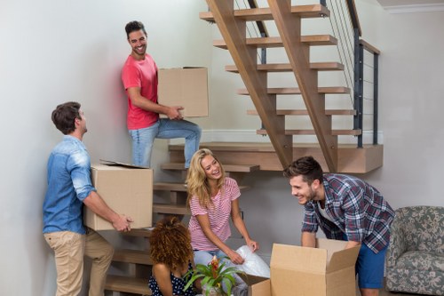 Removal team planning a Brixton home move outside a South London property