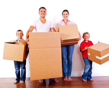 Packed moving boxes and protective materials for a Brixton home move
