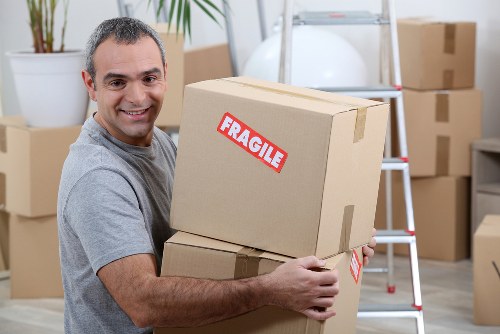 Man and van moving furniture in Brixton street