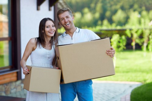 Packed boxes and furniture prepared for a Brixton apartment move