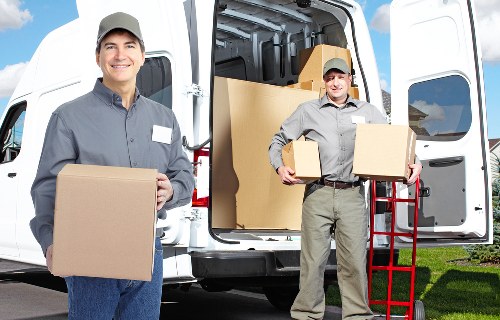 Professional movers handling a flat move in Brixton